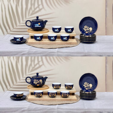 Bộ ấm trà dĩa lót xanh dương vẽ vàng hoa sen in logo VIB