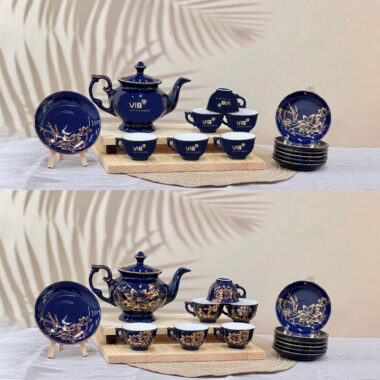 Bộ ấm trà dĩa lót xanh vẽ vàng hoa sen - logo VIB